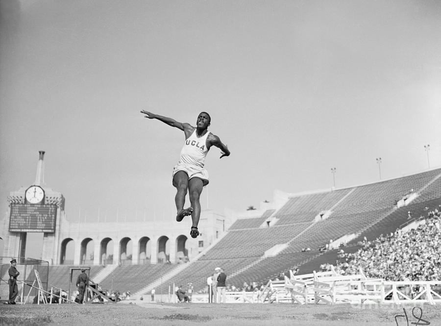 Jackie Robinson At A Track Meet Photograph by Bettmann