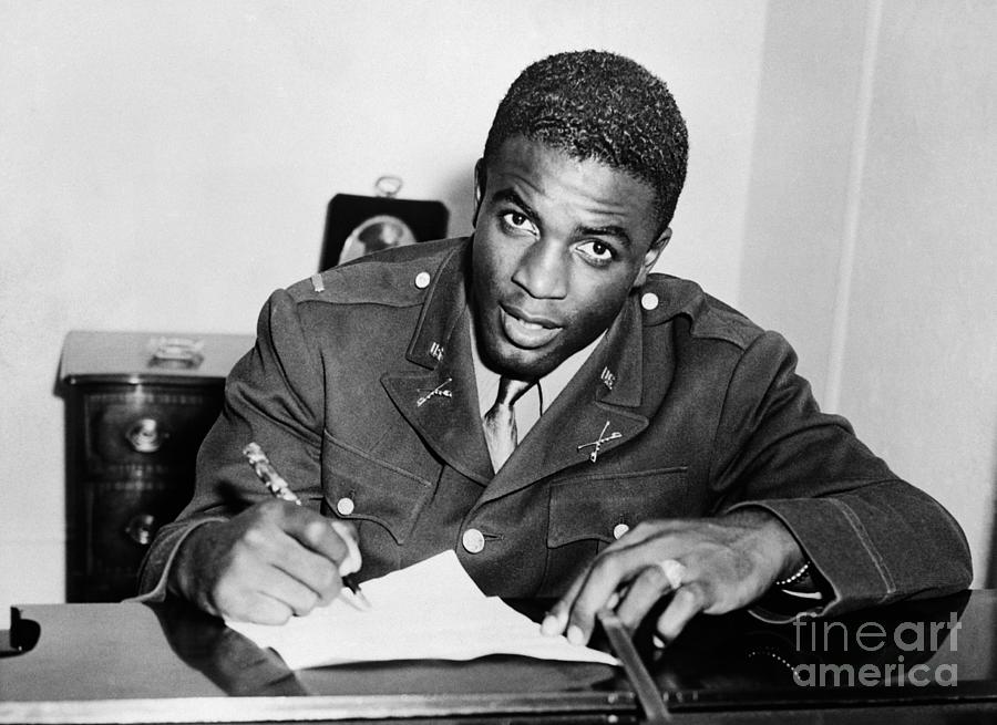 Jackie Robinson Photograph - Jackie Robinson Signing With Organized by Bettmann