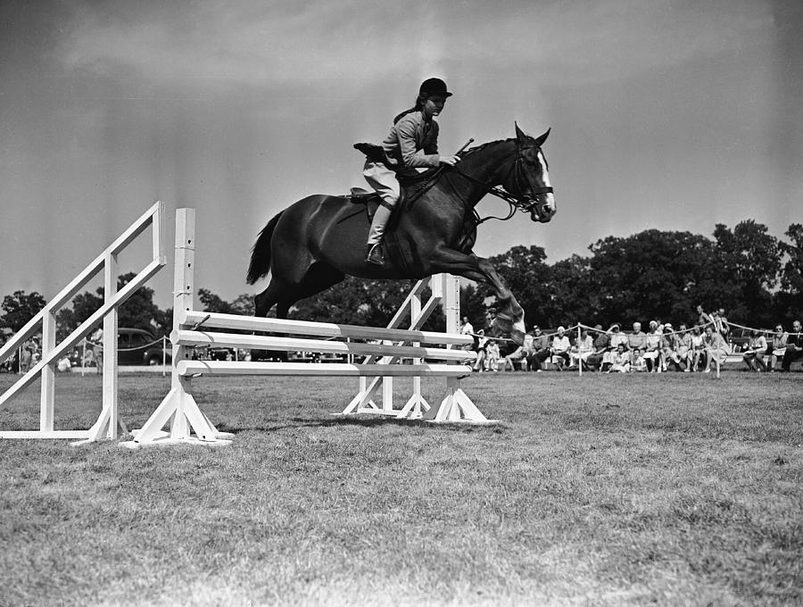 Jacqueline Bouvier Jumps On Her Horse Photograph by Bert Morgan