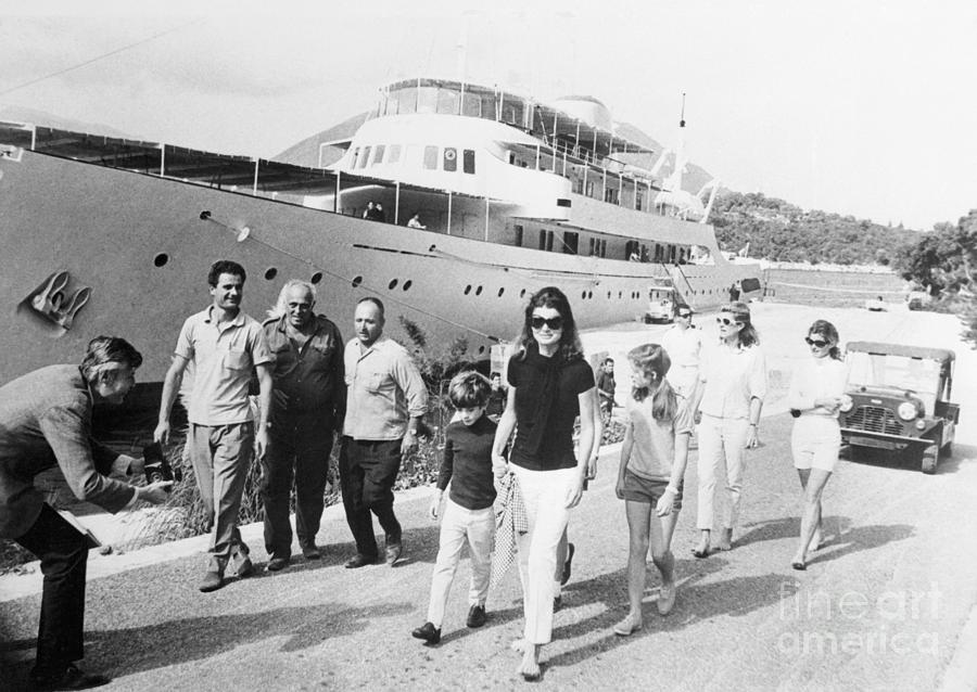Transportation Photograph - Jacqueline Kennedy Walking Beside Yacht by Bettmann