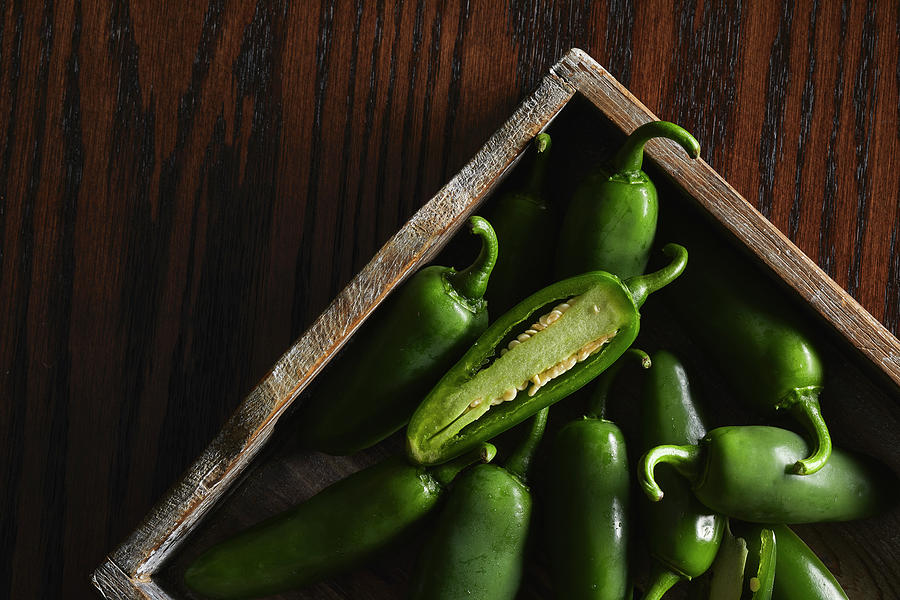 Jalapenos in a wooden box Photograph by Cuisine at Home