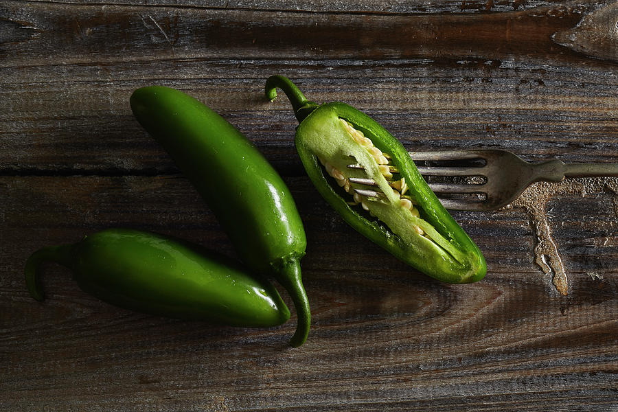 Jalapenos on rustic background Photograph by Cuisine at Home