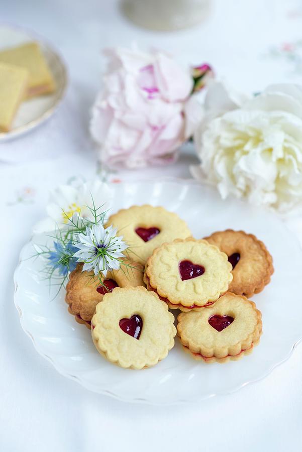 Jam Sandwich Biscuits Served With Tea Photograph by Lucy Parissi