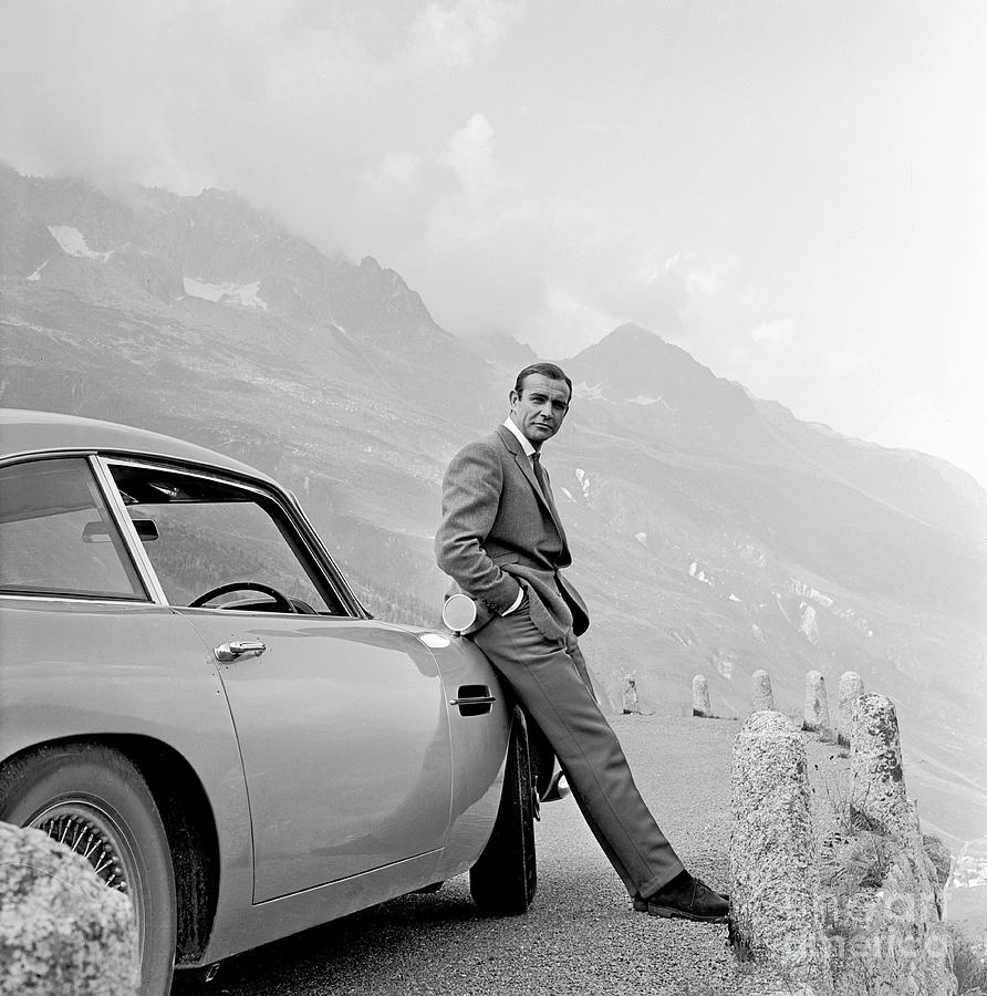 James Bond Photograph - James Bond Coolly Leaning on His Aston Martin  by Doc Braham