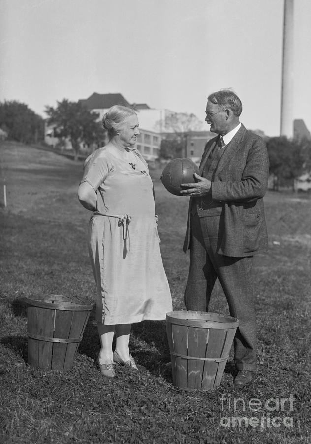 James Naismith Speaking To His Wife Photograph by Bettmann