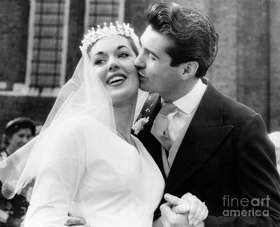 James Sharkey Kissing His Bride Isabel Photograph by Bettmann