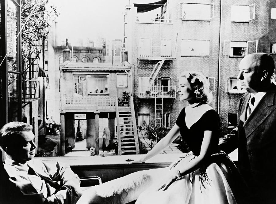 JAMES STEWART , GRACE KELLY and ALFRED HITCHCOCK in REAR WINDOW -1954-. Photograph by Album
