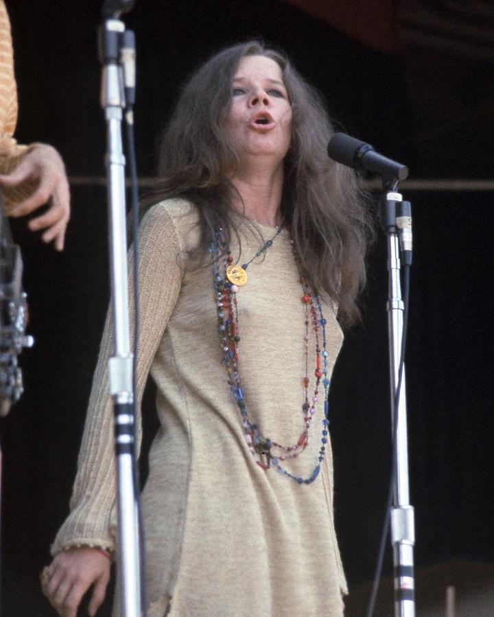 Janis Joplin Photograph - Janis Joplin And Peter Albin Singing Together On Stage by Globe Photos
