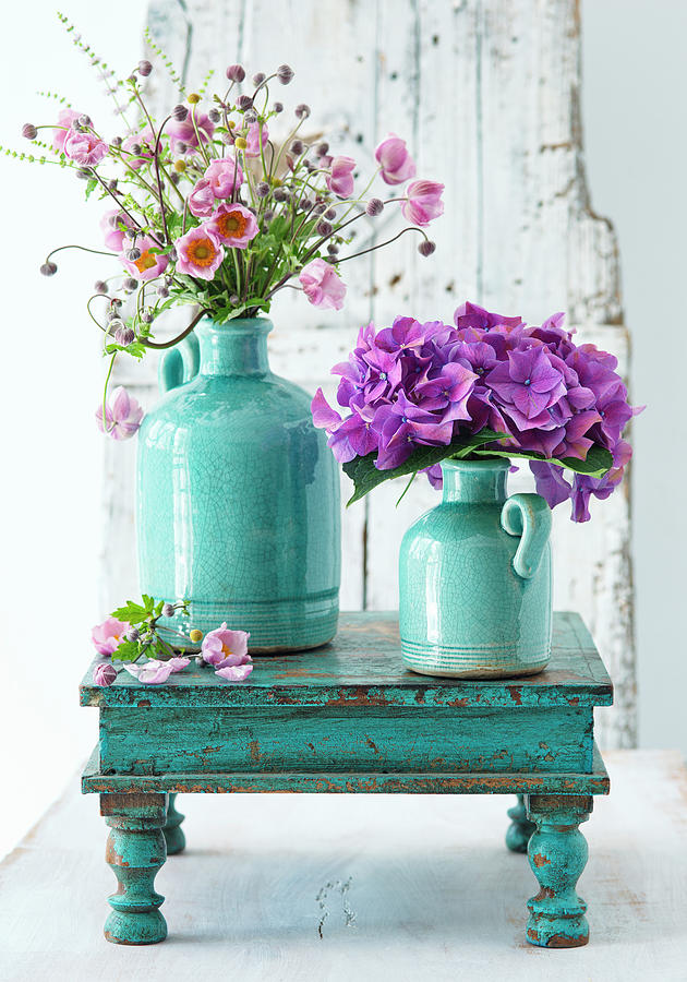 Japanese Anemones And Hydrangeas In Turquoise Vases Photograph by Alena Hrbkov