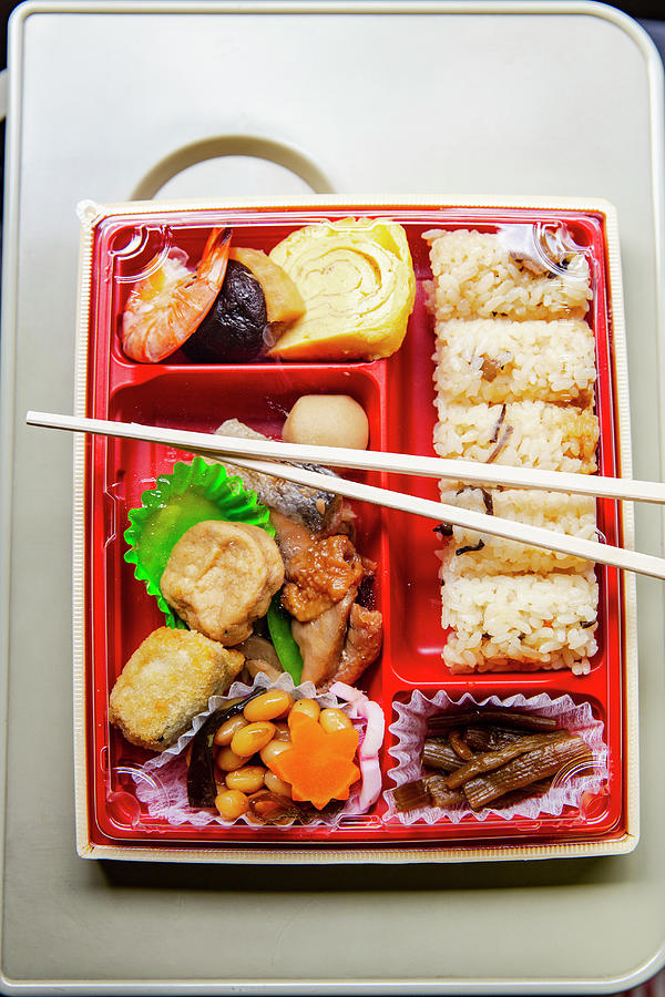 Japanese Bento Box With Rice, Omelette, Prawn And Tofu Photograph by ...