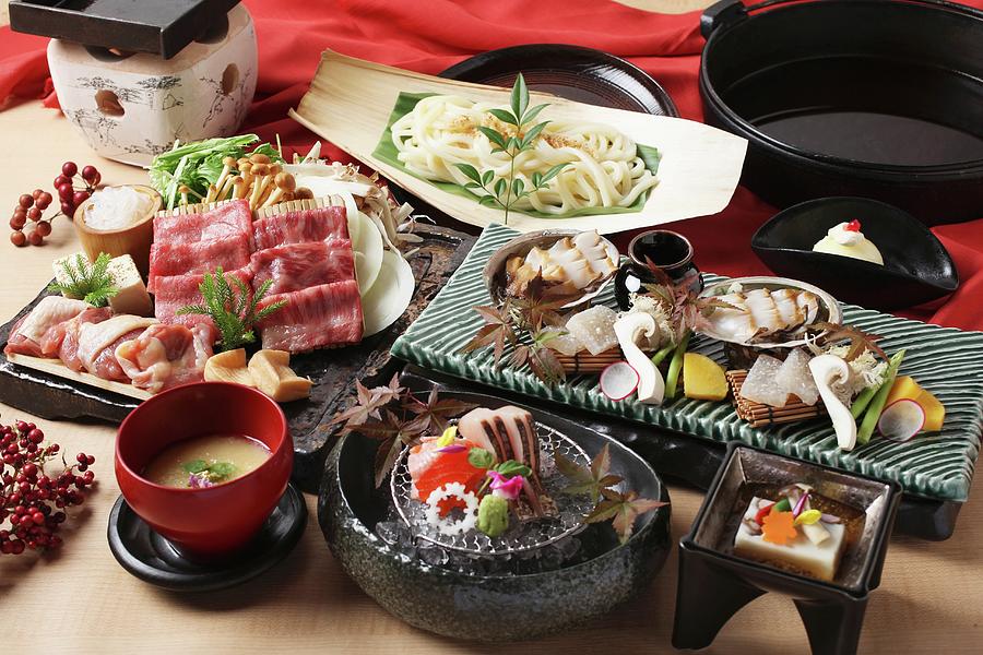 Japanese Party Dishes With Beef, Udon Noodles And Sashimi japan Photograph by Yuichi Nishihata Photography