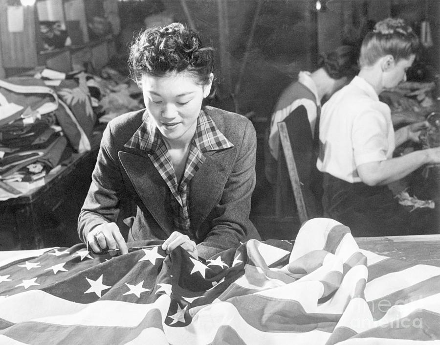 Japaneses Woman Sewing American Flag Photograph by Bettmann