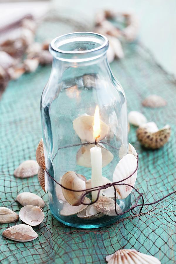 Jar With Cord, Shells And Candle Photograph by Martina Schindler