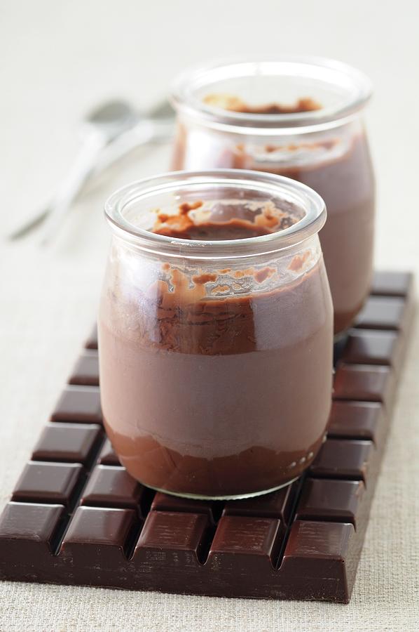 Jars Of Chocolate Pudding Photograph by Jean-christophe Riou