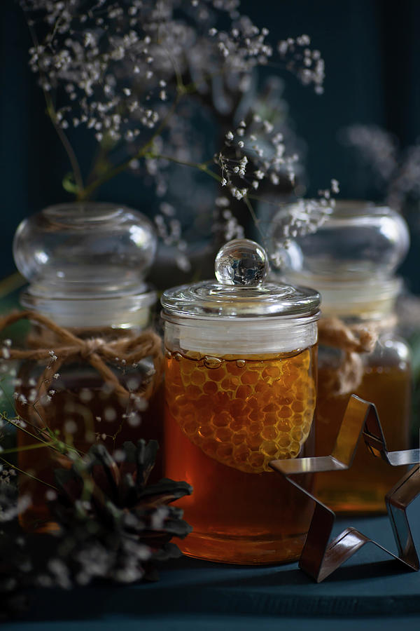 Jars Of Honey And Honeycomb Decorated With Gypsophilia Photograph by Alicja Koll