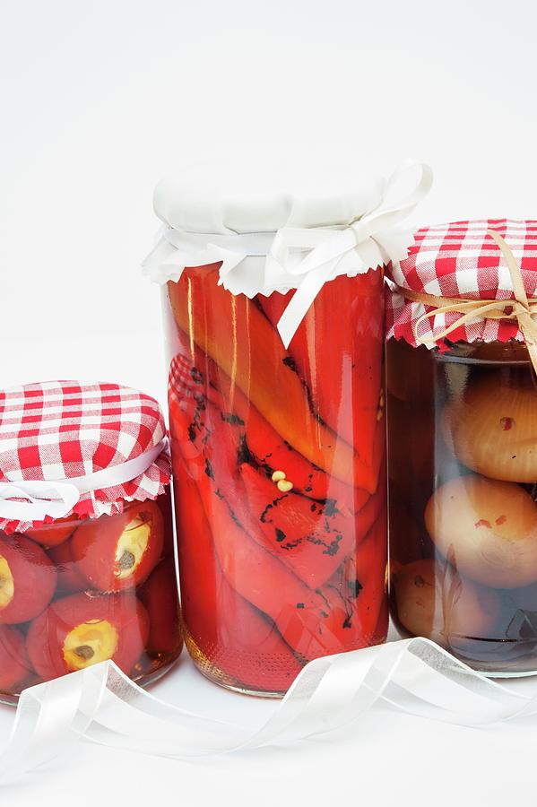 Jars Of Pickled Peppers, Chillis And Onions As Homemade Christmas Presents Photograph by Linda Burgess