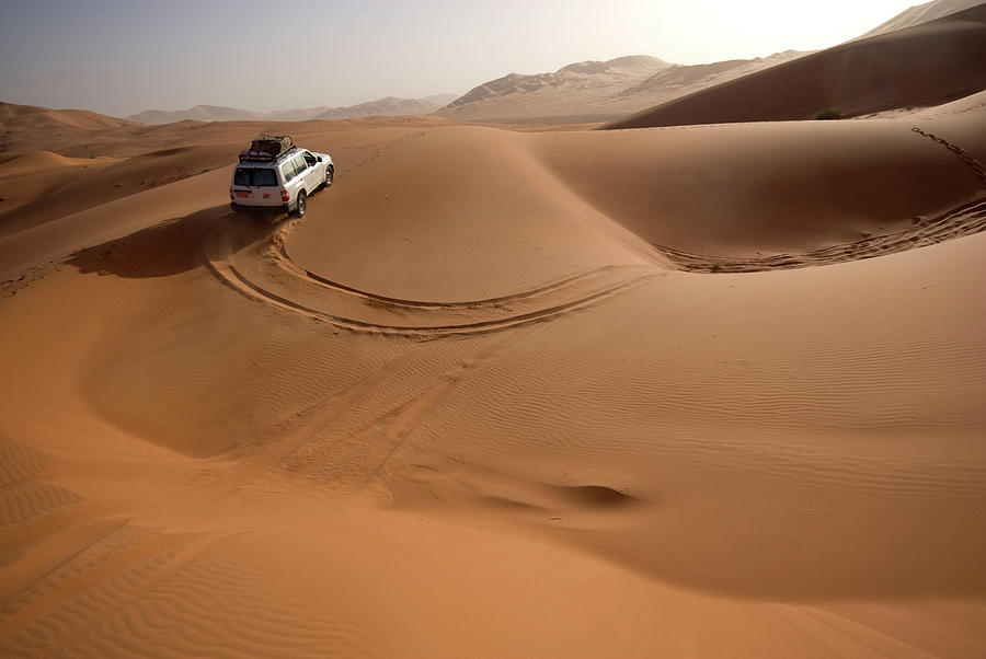 Jeep Climbing Dunes, Dhofar, Oman Digital Art by Aldo Pavan