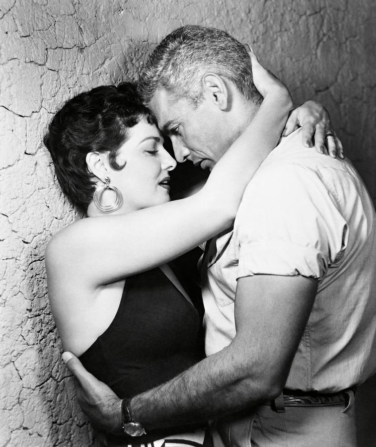 JEFF CHANDLER and JANE RUSSELL in FOXFIRE -1955-. Photograph by Album