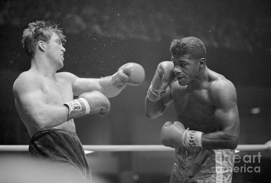 Sports Photograph - Jerry Quarry And Floyd Patterson Boxing by Bettmann