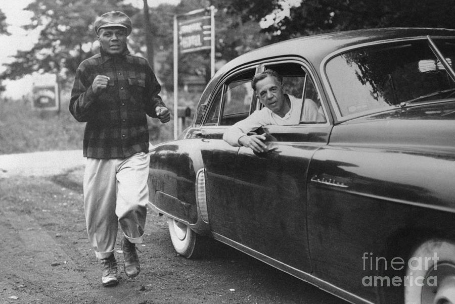 Jersey Joe Walcott Running Besides Car Photograph by Bettmann