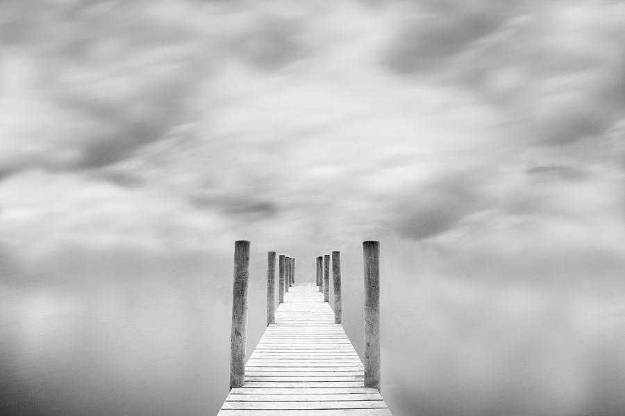 Jetty Against Cloudy Sky Photograph by Doug Chinnery