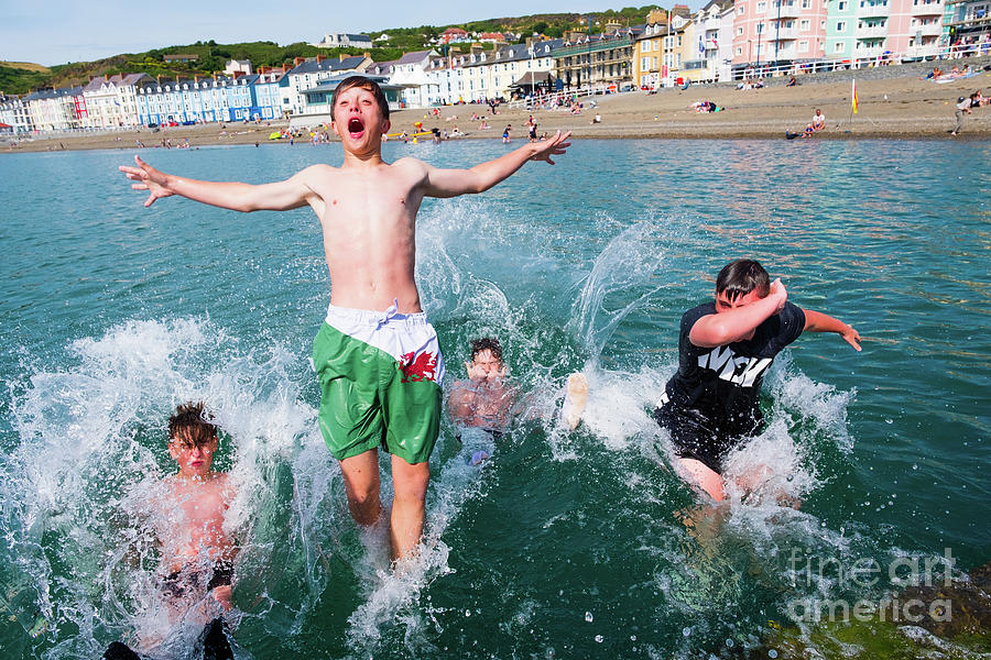 Aberystwyth Photograph - Jetty Jumping Into The Sea by Keith Morris Aberystwyth Photograph - Jetty Jumping Into The Sea by Keith Morris