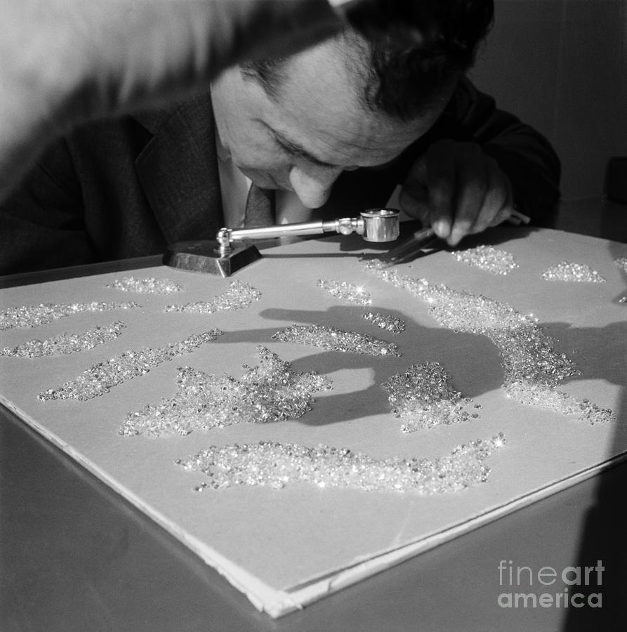 Jeweler Inspecting Polished Diamonds Photograph by Bettmann