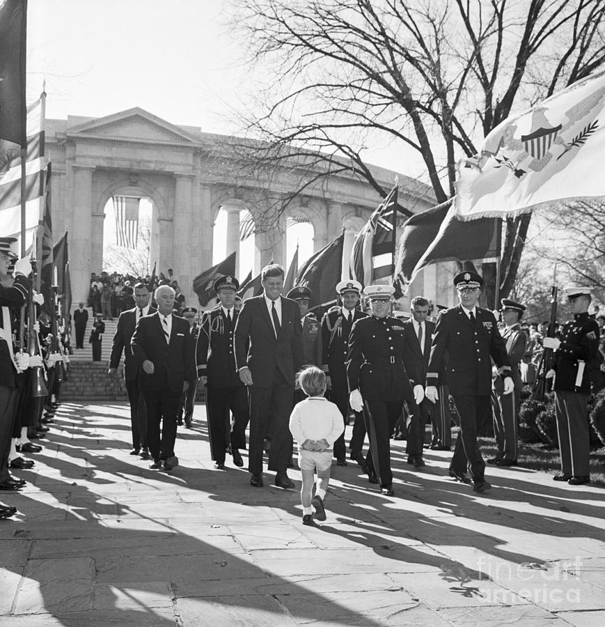 John F Kennedy Photograph - J.f.k. And Son At Arlington by Bettmann