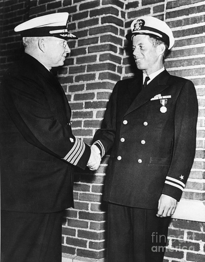 Jfk Shakes Hands With Navy Captain Photograph by Bettmann