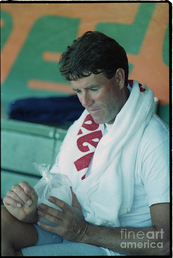 Jim Palmer Holds Ice Pack On Handbaseba Photograph by Bettmann