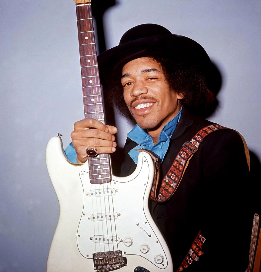 Jimi Hendrix Photograph - Jimi Hendrix Candid And Smiling With Guitar by Globe Photos