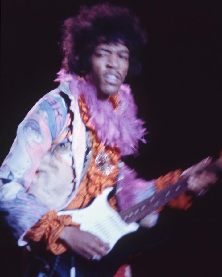 Jimi Hendrix Photograph - Jimi Hendrix Moving While Playing Guitar On Stage At Monterey International Pop Festival by Globe Photos