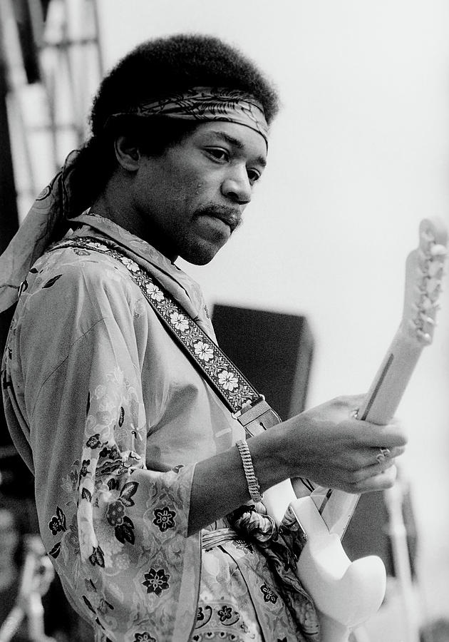 Jimi Hendrix Photograph - Jimi Hendrix Performing At The Newport Jazz Festival by Ted Kessel
