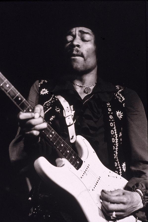 Jimi Hendrix Performs Photograph by Hulton Archive