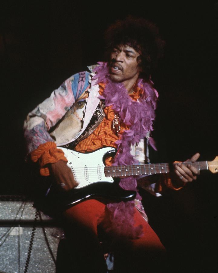 Jimi Hendrix Photograph - Jimi Hendrix Playing Guitar At Monterey International Pop Festival by Globe Photos