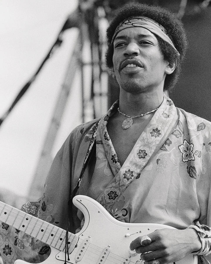 Jimi Hendrix Photograph - Jimi Hendrix: The Rock God With His Guitar by Globe Photos