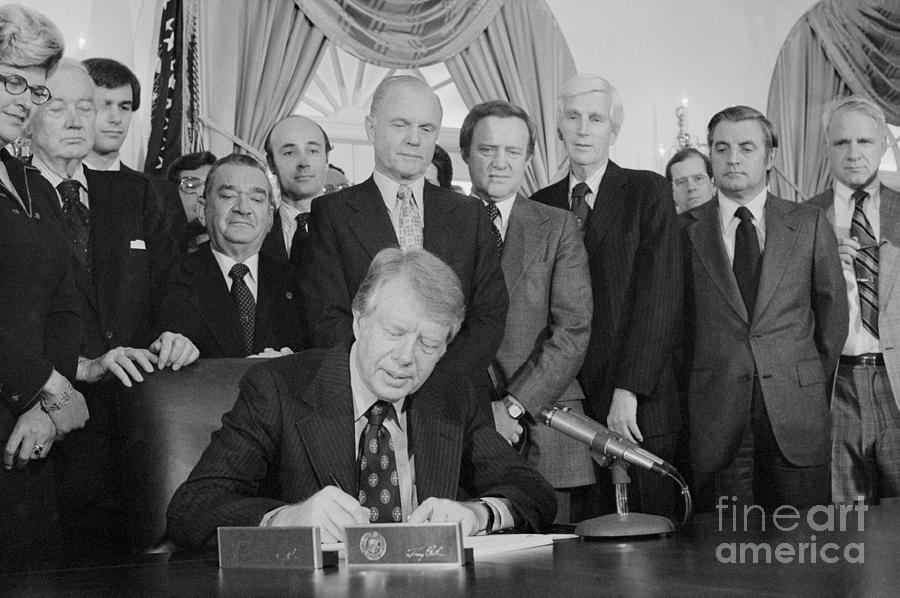 Jimmy Carter Signing Act Photograph By Bettmann - Fine Art America