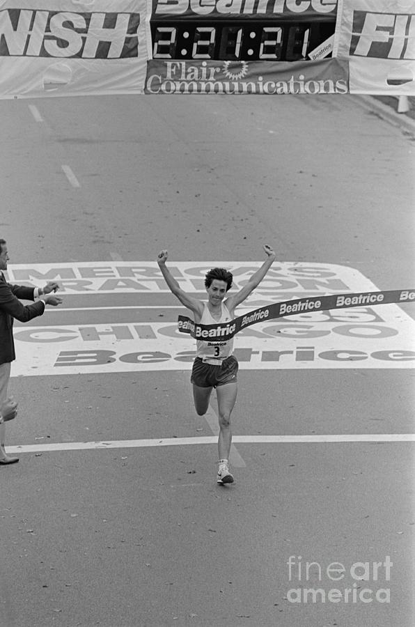 Joan Benoit Running Through Finish Line Photograph by Bettmann