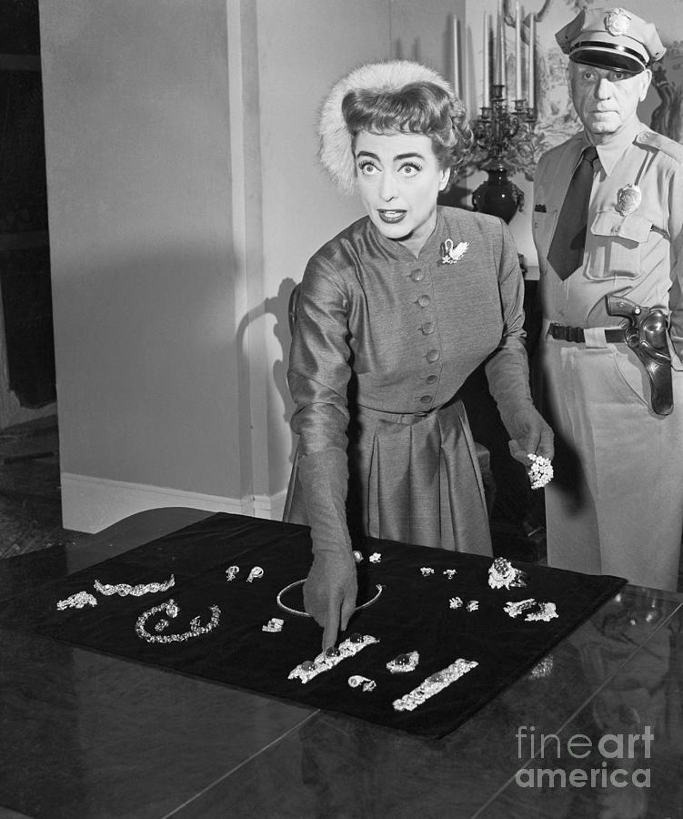 Joan Crawford Selecting Jewelry Photograph by Bettmann