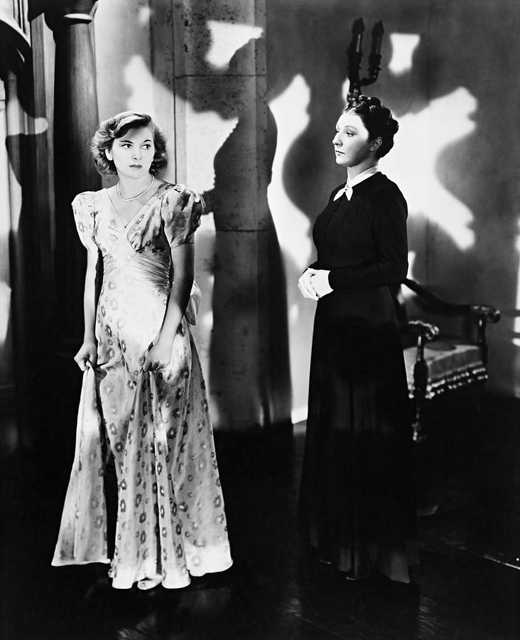 JOAN FONTAINE and JUDITH ANDERSON in REBECCA -1940-. Photograph by Album
