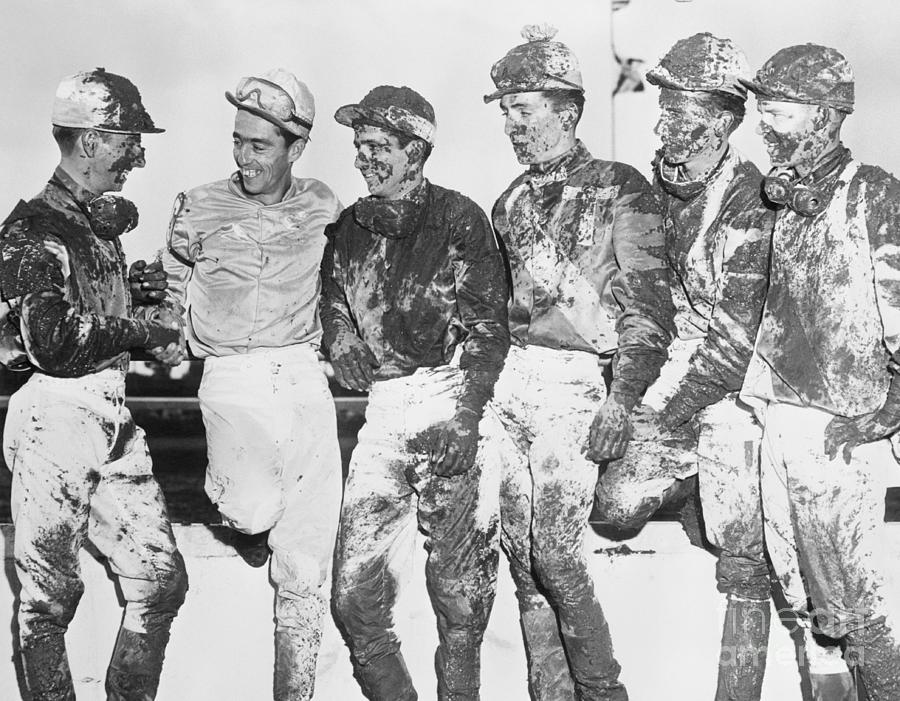 Jockeys Covered In Mud Photograph by Bettmann