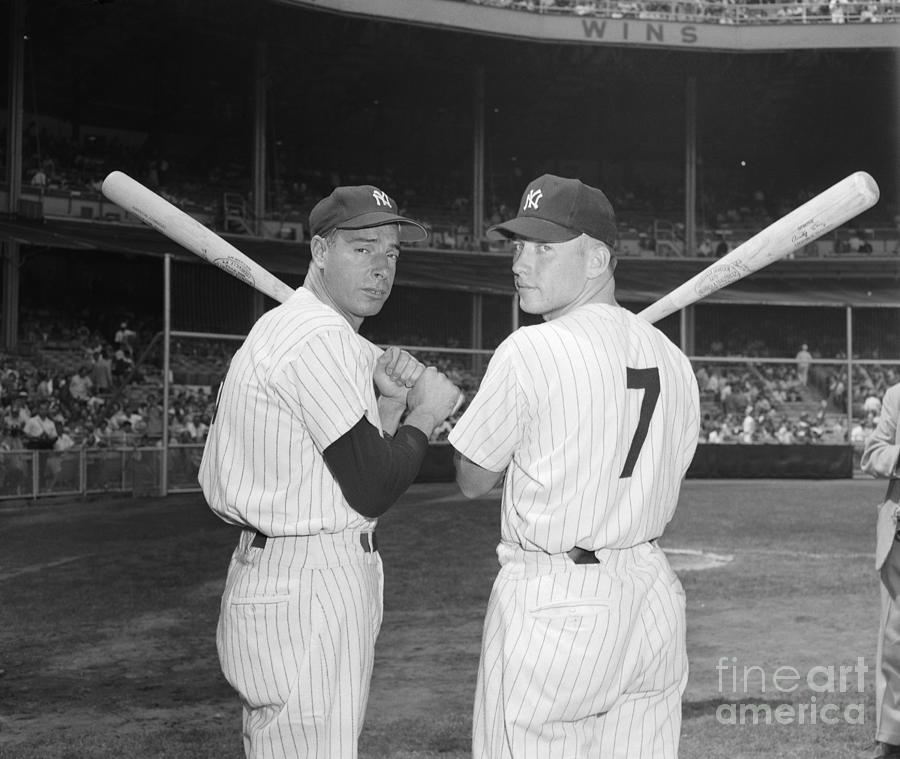 Joe Dimaggio And Mickey Mantle Holding Photograph by Bettmann