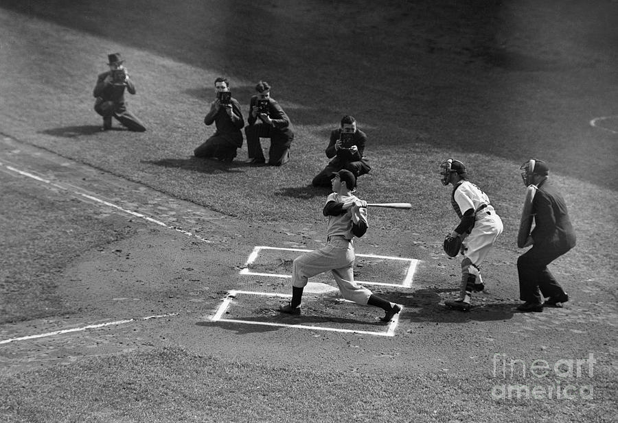 Joe Dimaggio Hitting Baseball Photograph by Bettmann
