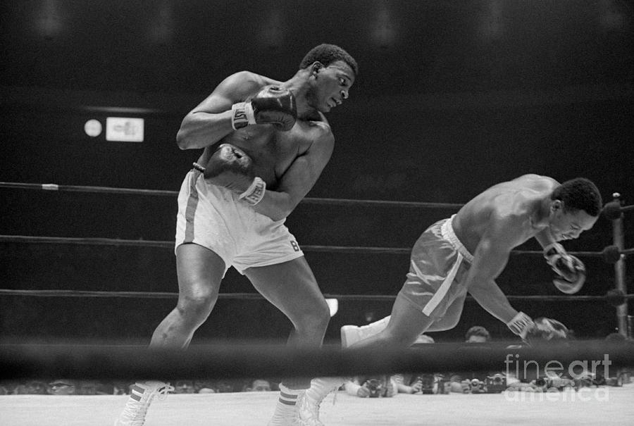 Joe Frazier Boxing Against Buster Mathis Photograph by Bettmann