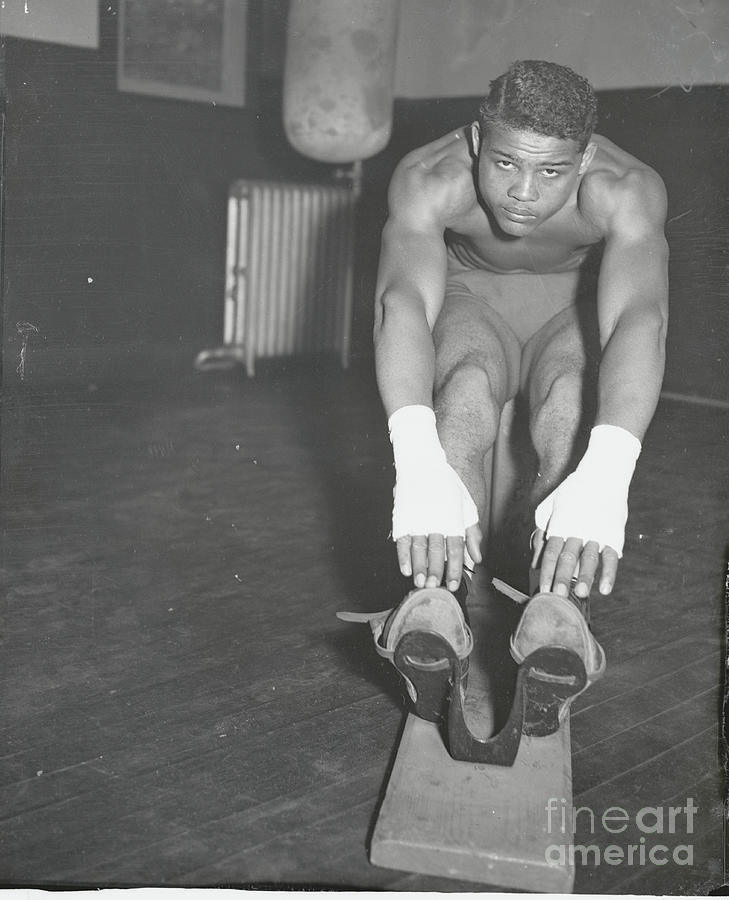 Joe Louis Stretching His Muscles Photograph by Bettmann