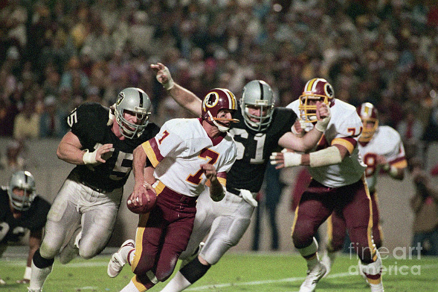 Joe Theismann About To Be Tackled Photograph by Bettmann Joe Theismann About To Be Tackled Photograph by Bettmann
