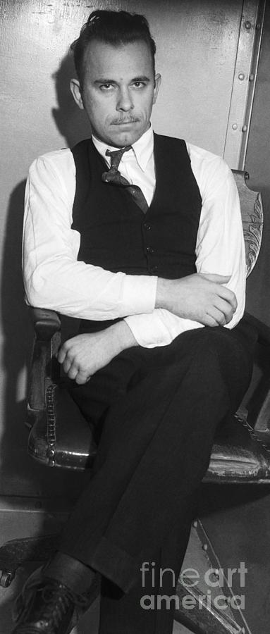 John Dillinger Sitting In Police Custody Photograph by Bettmann