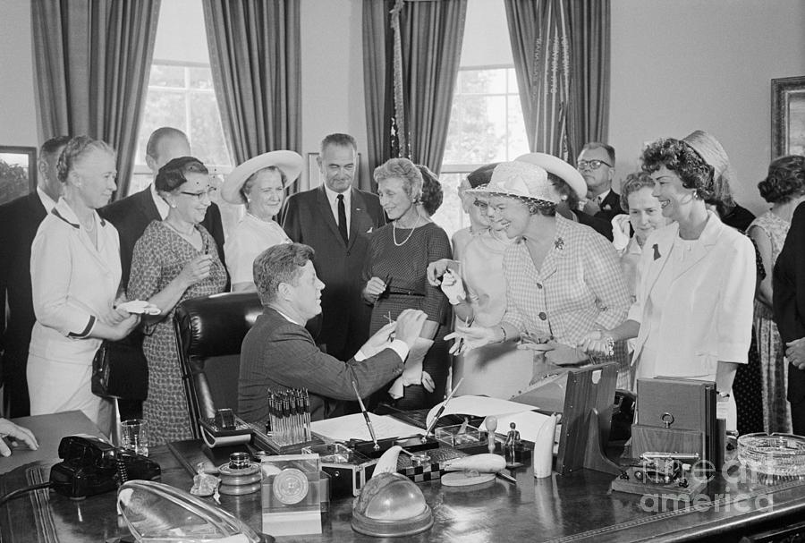John F Kennedy Celebrating Equal Pay Law Photograph by Bettmann