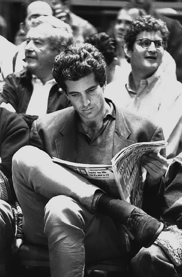 Basketball Photograph - John F. Kennedy Jr. Peruses The Daily by New York Daily News Archive