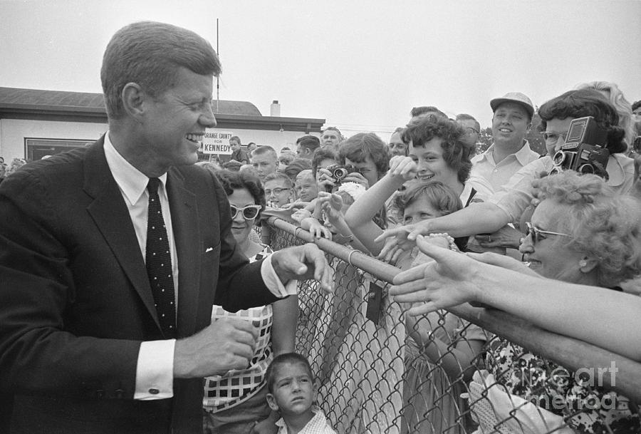 John F. Kennedy Smiling At Welcomers Photograph by Bettmann